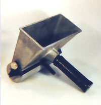 Photo of a hand held glue spreader